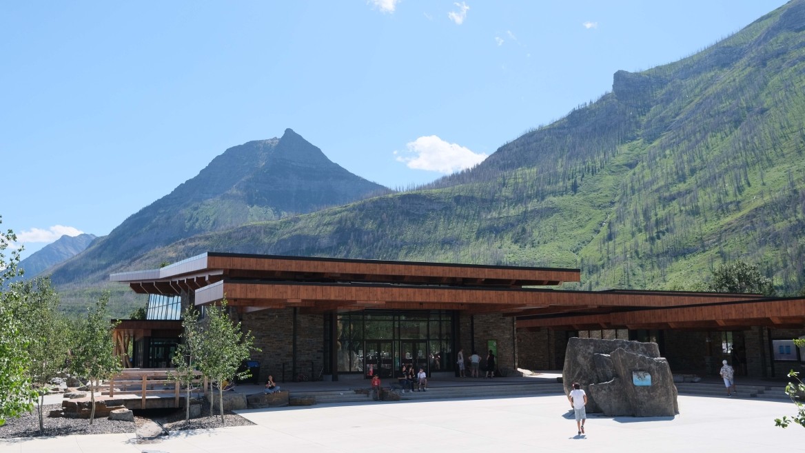 The new Waterton Lake Visitor Centre on a sunny day with blue skies 